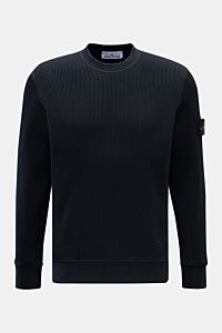 Stone Island Rundhalspullover 'Waffle' navy shown from the front on a plain background, slim fit with waffle knit cotton, round neckline, compass badge on upper arm, cuffs and inserts made of sweat fabric. Basic Piece mit Twist: Dieser Pullover im Waff