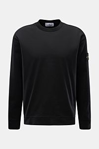 Front view of Stone Island Long sleeve black crew neck sweatshirt in heavy cotton jersey with compass badge on the sleeve.

Description: 
With this crew neck long sleeve in heavy cotton jersey with compass badge on the sleeve, STONE ISLAND brings us a 