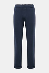 Front view of 04651/ A trip in a bag Jogger pants 'If' navy in soft cotton jersey with tapered fit, elasticated waistband, faux fly, French pockets, patch back pocket, and fixed hem turn-up, showcasing comfort and modern silhouette.

Comfort meets styl