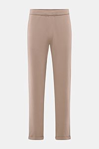 Front view of 04651/ A trip in a bag Jogger pants 'If' taupe in soft cotton jersey with tapered fit, elasticated waistband, drawstring, and fixed hem turn-up.

Description:
Comfort meets style: These jogger pants in soft cotton jersey by 04651/ A TRIP 