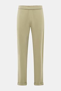 Front view of 04651/ A trip in a bag Jogger pants 'If' sage in soft cotton jersey with tapered fit, elastic waistband, French pockets, and fixed hem turn-up.

Comfort meets style: These jogger pants in soft cotton jersey by 04651/ A TRIP IN A BAG enhan