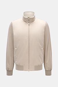 Front view of Mandelli Blouson beige, a slim fit, high-quality microfibre jacket with goat suede trim, ribbed bands, two-way zip, hip and inside pockets, and a high-closing standing collar, combining luxury and comfort for mild days.