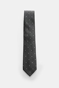 Tom Ford Seidenkrawatte dunkelgrau/schwarz/creme gemustert, Fischgrat mit Punkten, reine Seide, dezenter Glanz, frontal fotografiert, 8 cm breit, made in Italy.