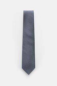 Tom Ford Seidenkrawatte navy/creme gemustert, frontale Draufsicht, reine Seide, dezenter Glanz, grafisches Muster, Logo-Stitching, made in Italy, 8 cm breit.