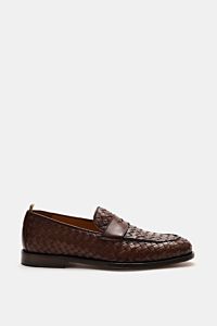 Side view of Officine Creative Penny Loafer 'Opera' braun in brown woven suede leather with slim silhouette, Blake construction, penny strap, decorative stitching, leather lining, and leather sole. Stylishly crafted for a refined spring wardrobe.