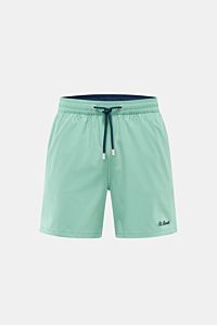 Front view of MC2 Saint Barth Badeshorts 'Comfort' türkis in light turquoise with navy drawstring, elastic waistband, and St. Barth embroidery.

Tauchen Sie ein in die erfrischende Welt von MC2 SAINT BARTH: Die Badeshorts 'Comfort' aus leichter, schnel