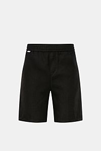 Front view of 04651/ A trip in a bag Linen shorts black, made of airy linen fabric with elastic waistband, French pockets, and patch back pocket.

Description: With this airy model, 04651/ A TRIP IN A BAG presents a comfortable pair of pure linen short