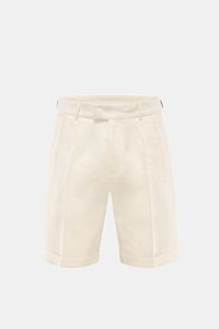 Front view of 04651/ A trip in a bag Linen shorts cream in pure linen with double pleats, side adjusters, French pockets, hip pockets, fixed hem turn-up.

Perfect for warm days: These linen shorts by 04651/ A TRIP IN A BAG are the ideal summer essentia