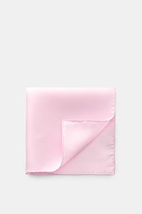 Top-down view of Tom Ford Seiden-Einstecktuch rosé/weiß gepunktet, a folded silk pocket square with subtle polka dots and rolled edges.

Description: Dieses Einstecktuch von TOM FORD aus reiner Seide setzt mit seinem dezenten Punktmuster und den rollie