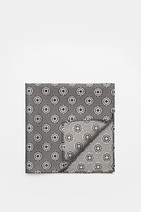 Top-down view of a folded Brunello Cucinelli Silk pocket square grey/black patterned with a fine medallion weave and rolled edges.

Elegant accent: This silk pocket square by BRUNELLO CUCINELLI has a fine medallion weave pattern that creates a subtle h