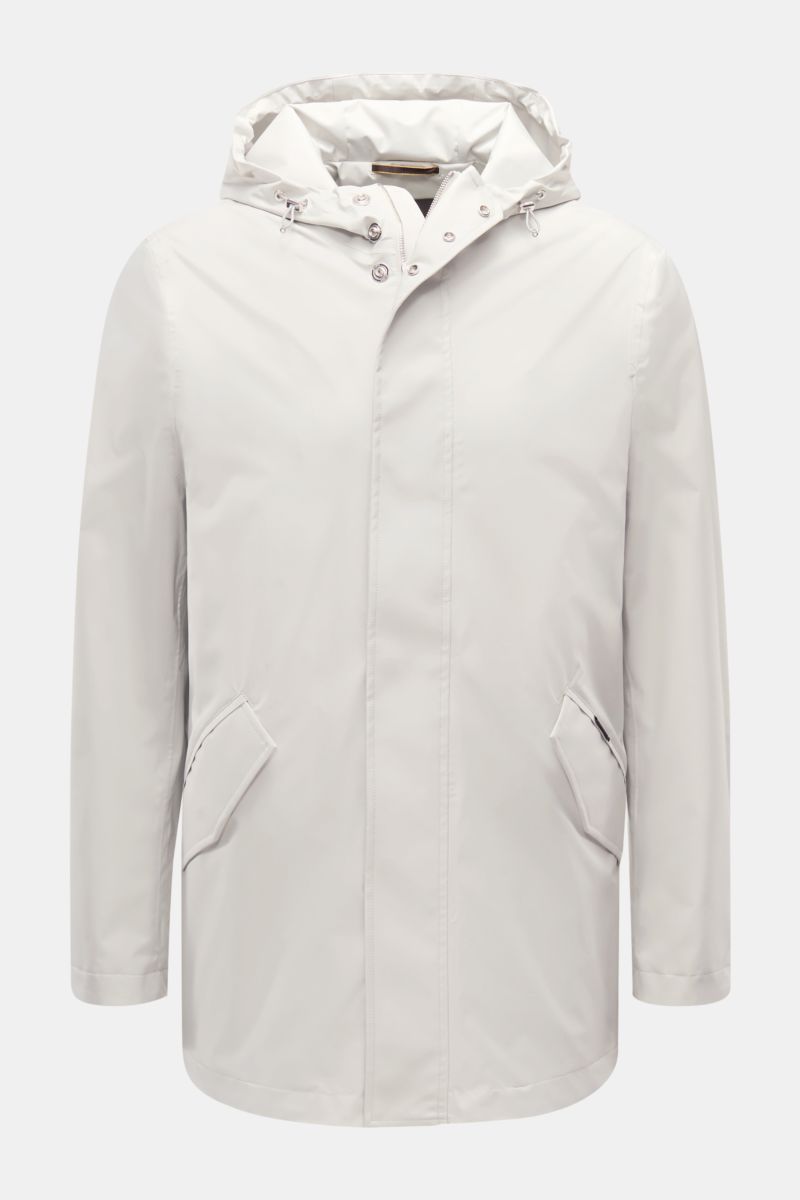 Front view of the Moorer Short coat 'Tiglio' light grey, featuring waterproof fabric, taped seams, hood, flap pockets, two-way zip, and slim fit. Premium outerwear for challenging conditions with smooth lining and two inside pockets.