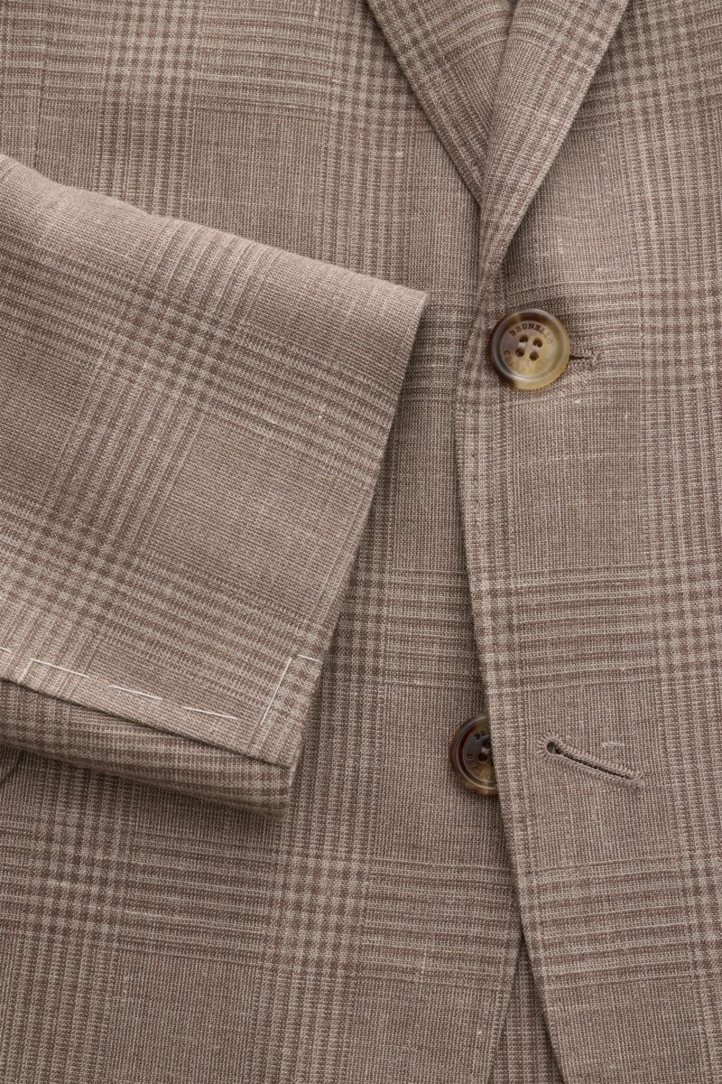 Brunello Cucinelli Anzug graubraun/grau kariert, Detailaufnahme des Unconstructed-Sakkos mit Glencheck-Muster, Knöpfen und Ärmelabschluss, edler Woll-Seide-Leinen-Mix.