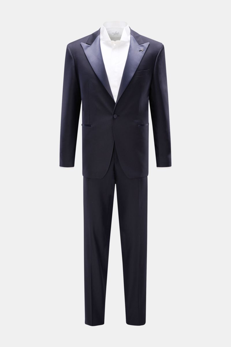 Front view of Tagliatore Tuxedo navy in pure Super 110'S virgin wool with satin lapel, slim fit jacket, and tapered trousers, styled with white shirt.