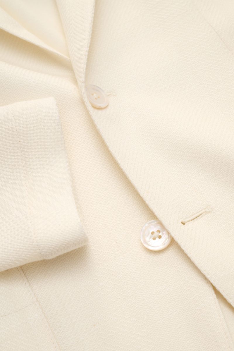 Close-up front view of the Marco Pescarolo Blazer 'Giove' cream showing buttons and fabric texture. Lightweight blazer with maximum comfort: MARCO PESCAROLO designs not just elegant trousers but also blazers to go with them, like the model 'Giove' in a fi