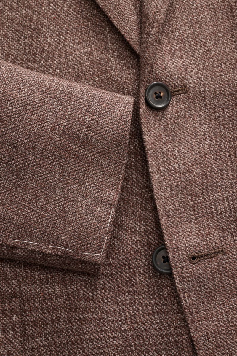 Alt tag (125 characters max): Close-up front view of Corneliani Smart-casual jacket brown melange with button, fine virgin wool and linen weave.

Description:
Superlative style from CORNELIANI: in a optimal fit made with Italian expertise, this smart-c