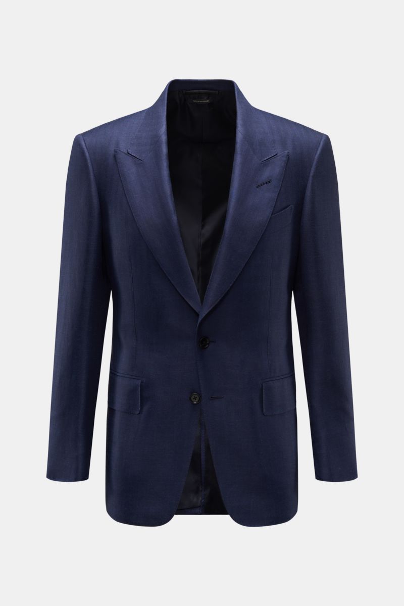 Front view of Tom Ford Sakko 'Shelton' navy, a slim fit, two-button jacket in a wool, silk, and linen mix with subtle herringbone pattern, soft touch, peak lapels, classic chest pocket, flap hip pockets, back side vents, unfinished sleeve cuffs, and four 