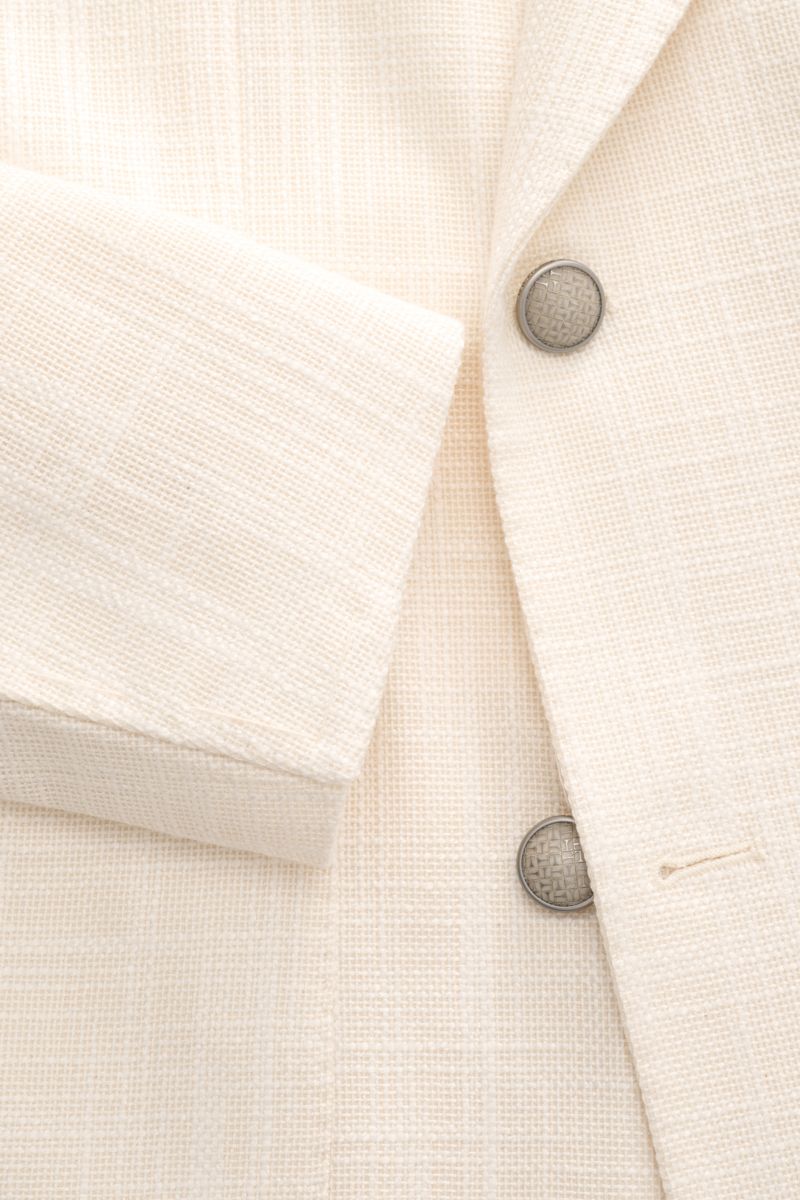 Tagliatore Sakko 'Vesuvio' creme aus leichter Viskose-Baumwolle-Leinen-Mischung, Detailaufnahme von Ärmel, Knöpfen und Webstruktur, Slim Fit.