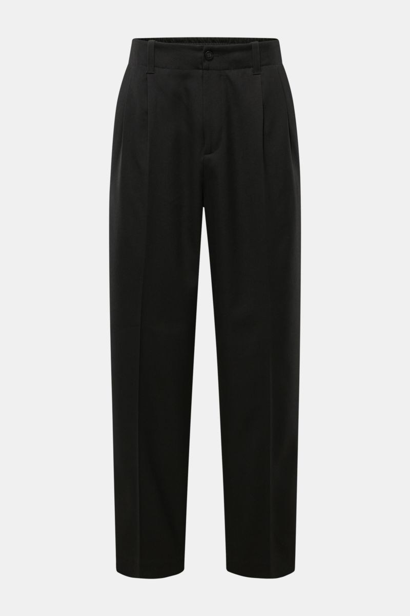 Front view of Golden Goose Wool trousers black in pure virgin wool twill, tapered fit with double pleat, ankle length, zip and button, French and hip pockets, partially elasticated waistband, and rivet detail at the waist. Timeless elegance in a modern st