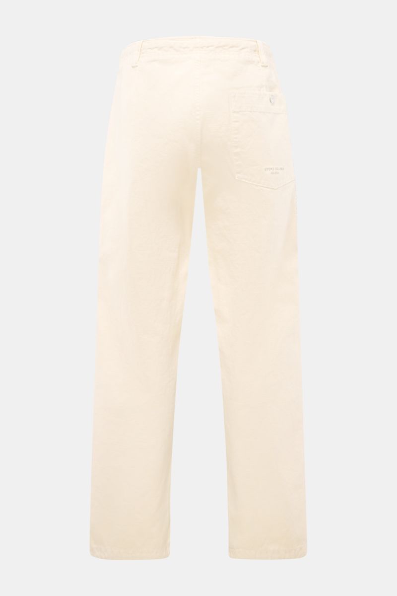 Stone Island Cargohose 'Marina' creme shown from the back, made of pure cotton with regular fit, button fly, cargo pocket, and adjustable leg cuffs. Maritime Utility-Ästhetik: Die Cargohose aus der 'Marina'-Kollektion von STONE ISLAND vereint funktionale 