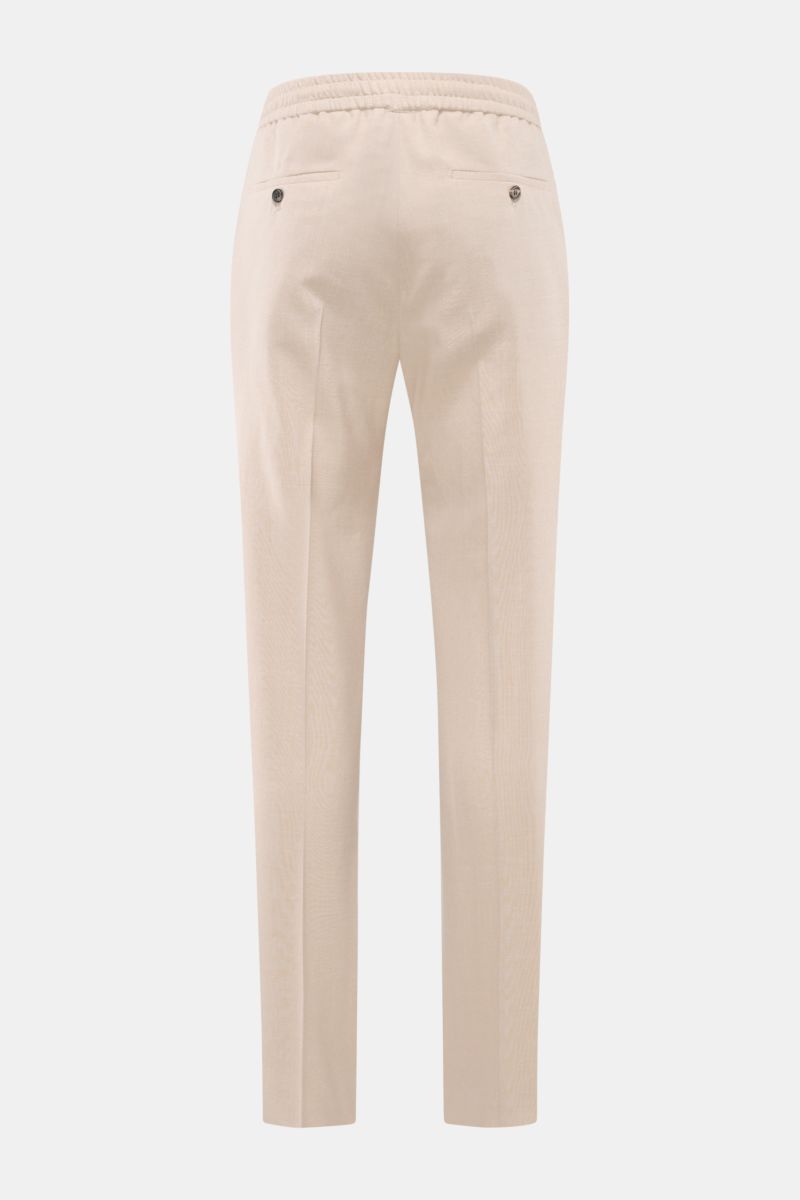 Incotex Jogger pants sand shown from the back, made of wool, silk and linen blend, elasticated waistband with drawstring, buttoned back pockets.