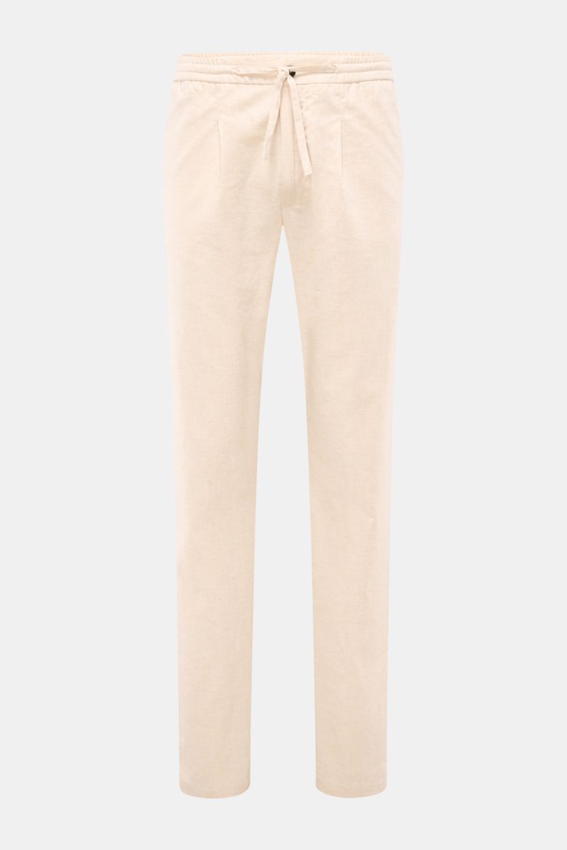 Front view of Aurélien Leinen-Jogpants creme meliert, made of pure linen with a regular fit, elastic waistband with drawstring, zipper and button, French pockets, narrow tapered legs, simple pleat, and piped back pocket, offering luxurious casual wear for