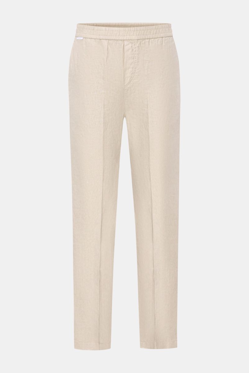 04651/ A trip in a bag Leinen-Jogpants 'Linen Pants' beige, knöchellang, Tapered Fit, elastischer Bund, französische Taschen, frontale Perspektive.