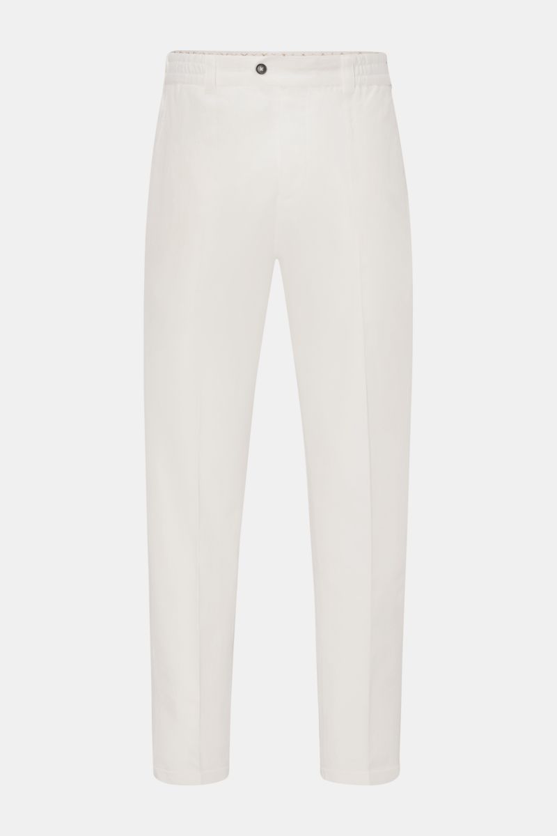 Front view of PT Torino Jogger pants 'The Rebel' off-white, cotton-linen blend with elasticated waistband, button fly, tapered cropped fit, French and back button flap pockets, and fixed hem turn-up. The jogger pants 'The Rebel' by PT TORINO have a comfor