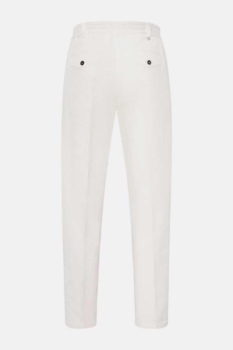 Rear view of PT Torino Jogger pants 'The Rebel' off-white, showing comfortable elasticated waistband, button fly, French pockets, back button flap pockets, regular fit, very tapered and cropped cut with fixed hem turn-up, made from a cotton and linen blen