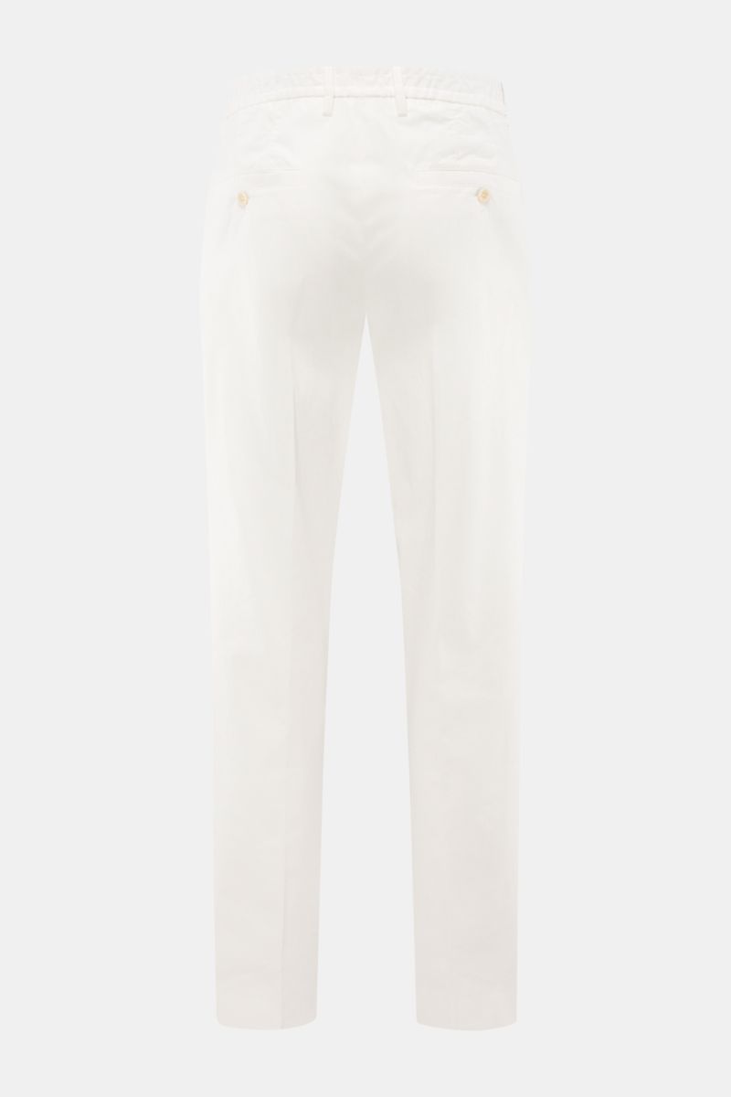 Rear view of GTA Chino 'Davide' creme pants showing twill cotton fabric, elastic waistband, buttoned back pockets, and slim tapered fit.