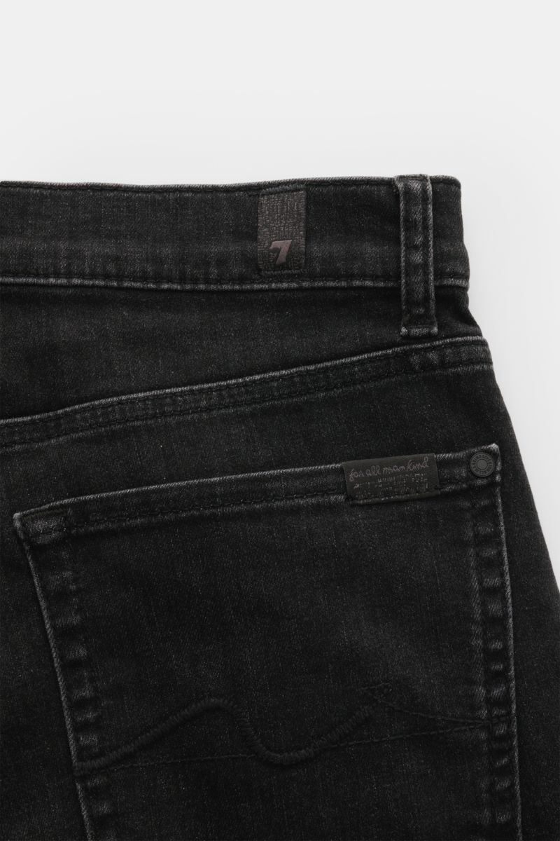 Close-up rear view of 7 for all mankind Jeans 'Slimmy' dark grey, showing back pocket with stitching, small woven label on waistband, and belt loop. 

Seven pairs of jeans should be enough to get you through life – that’s the philosophy of denim label 