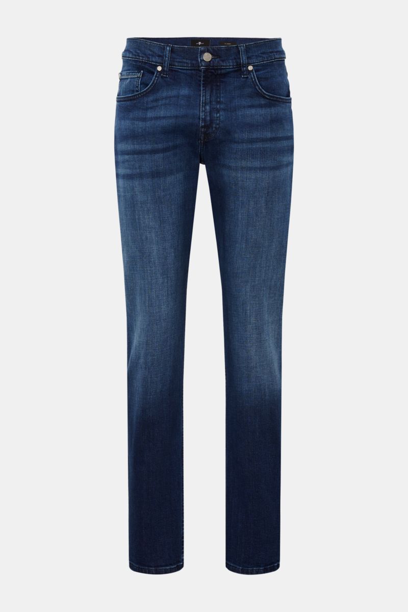 7 for all mankind Jeans 'Slimmy' dark blue shown from the front, slim fit with subtle used wash, elasticated cotton, zip fly, five-pocket style, back pockets with stitching, slightly tapered cut, and small woven label on the waistband. Seven pairs of jean