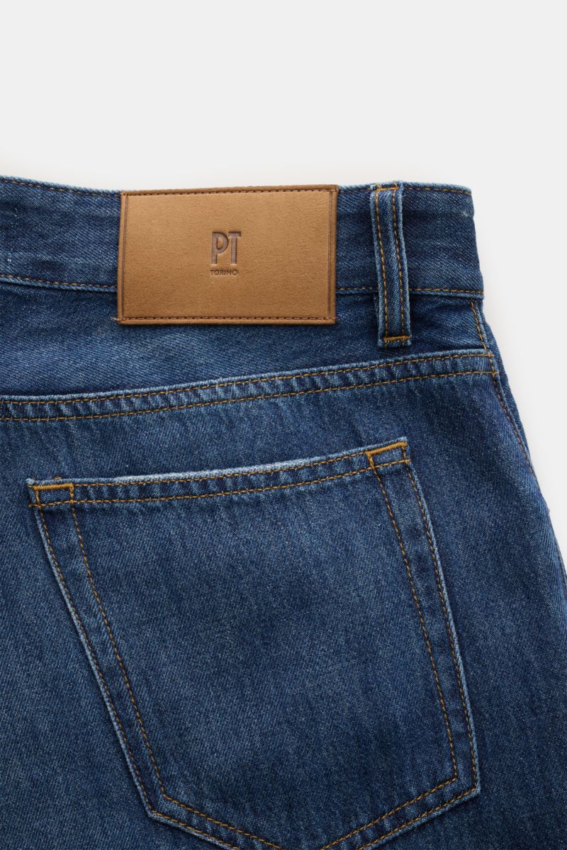 Close-up rear view of PT Torino Denim Jeans 'Rebel' grey-blue showing pure cotton denim with authentic used wash, five-pocket style, suede patch, and button fly in a casual tapered fit. Get a good look with trouser experts PT TORINO: the model 'Rebel' is 