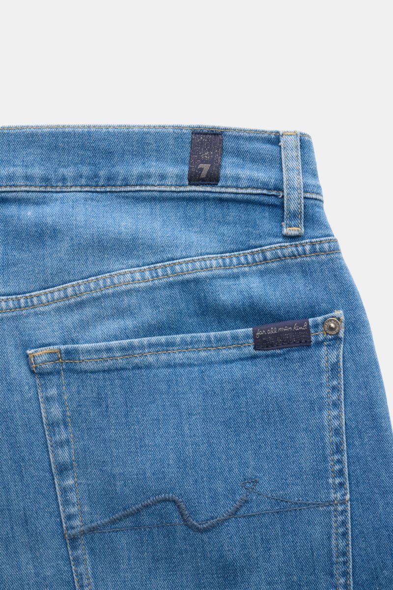 Close-up of the back pocket and waistband of 7 for all mankind Jeans 'The Straight' blue, showing light wash cotton denim and stitching.

Description: 'The Straight' model by denim label 7 FOR ALL MANKIND will be your new favourite jeans: with an authe