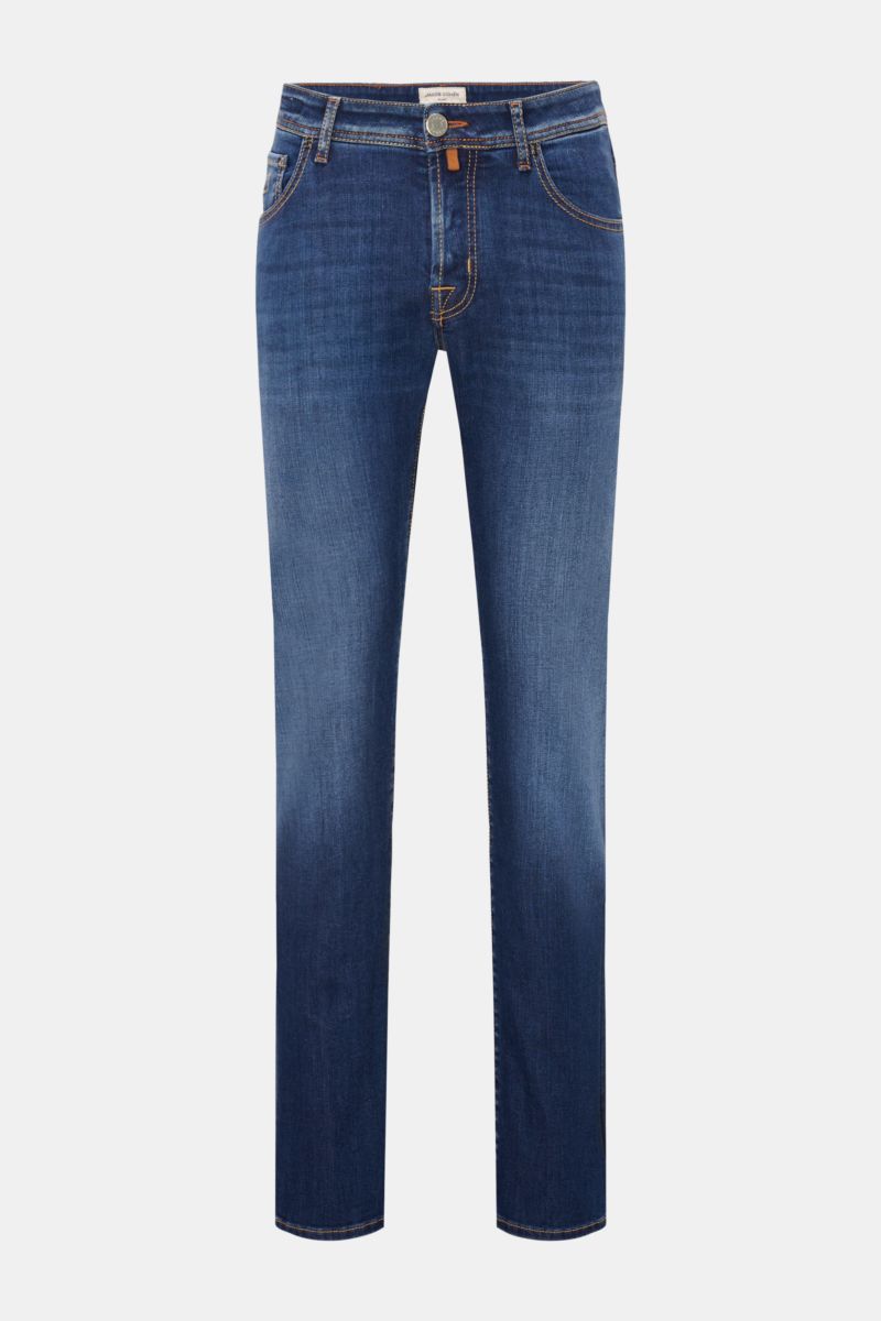 Front view of Jacob Cohen Jeans 'Nick' blue, slim fit tapered cut denim made of cotton with elasticated fabric, soft feel, subtle used wash, button fly, five-pocket style including coin pocket with initial, back pockets with stitching, and leather patch i