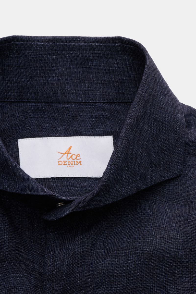 Close-up front view of the Ace Denim Linen shirt shark collar navy in lightweight navy pure linen fabric with visible yarn texture.

Stay comfortable in the warmer months: This ACE DENIM shirt in lightweight linen fabric is a casual statement piece for