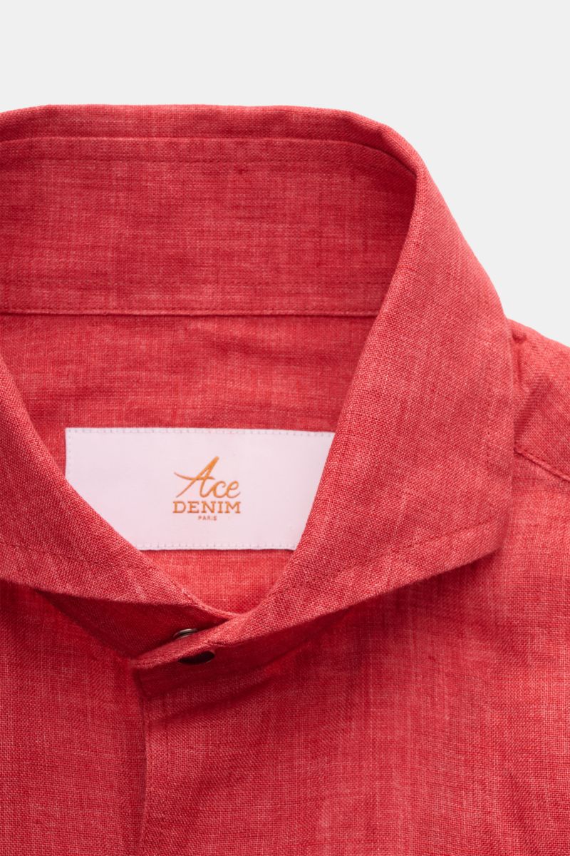 Close-up front view of Ace Denim Linen shirt shark collar red, showing lightweight pure linen fabric with visible yarn thickness and snap button details. Stay comfortable in the warmer months: This ACE DENIM shirt in lightweight linen fabric is a casual s