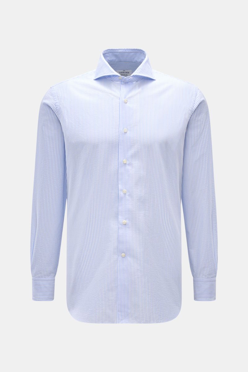 Front view of Gherardi Seersucker casual shirt shark collar light blue/white striped, slim fit with barrel cuffs and button placket.

This casual shirt by GIAMPAOLO is made of comfortable, fine seersucker fabric – a confident piece for the office and c