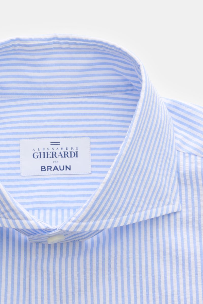 Alt tag (125 characters max): Close-up front view of Gherardi Seersucker casual shirt shark collar light blue/white striped with branded label inside collar.

This casual shirt by GIAMPAOLO is made of comfortable, fine seersucker fabric – a confident p