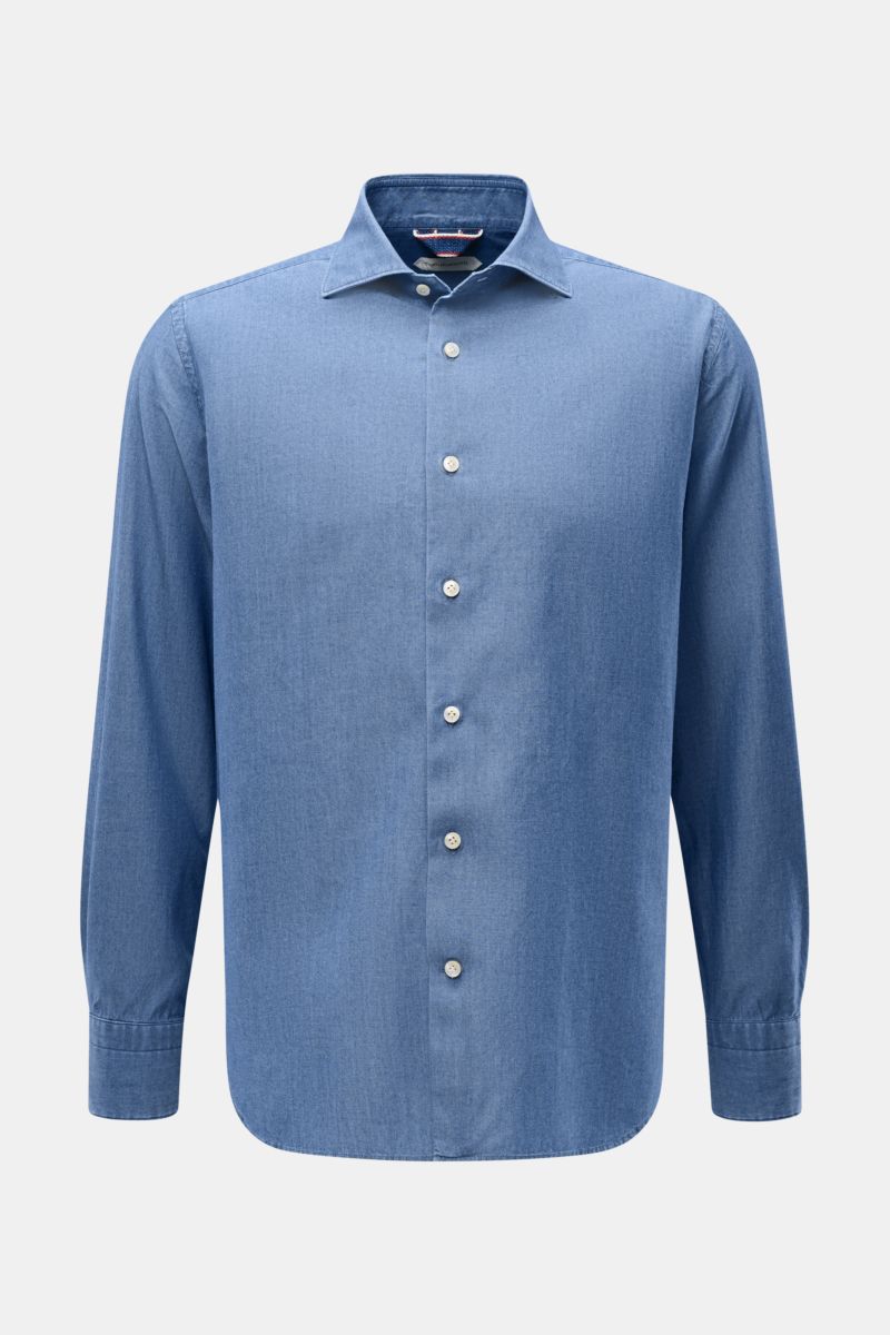 Front view of Guglielminotti Chambray shirt shark collar smoky blue in pure cotton with smooth feel, oversized fit, French button placket, classic barrel cuffs, and slightly rounded hem.