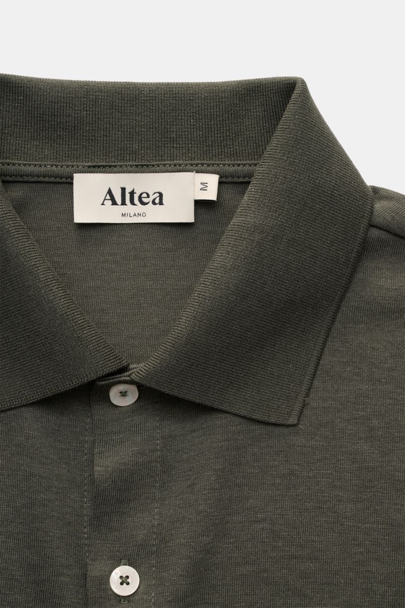 Altea Jersey shirt 'Julius' polo shirt collar dark olive shown close-up from above, highlighting the soft jersey fabric, polo collar, smooth button placket, and fine texture. If you can’t decide between a shirt and a polo shirt, choose the model 'Juliu