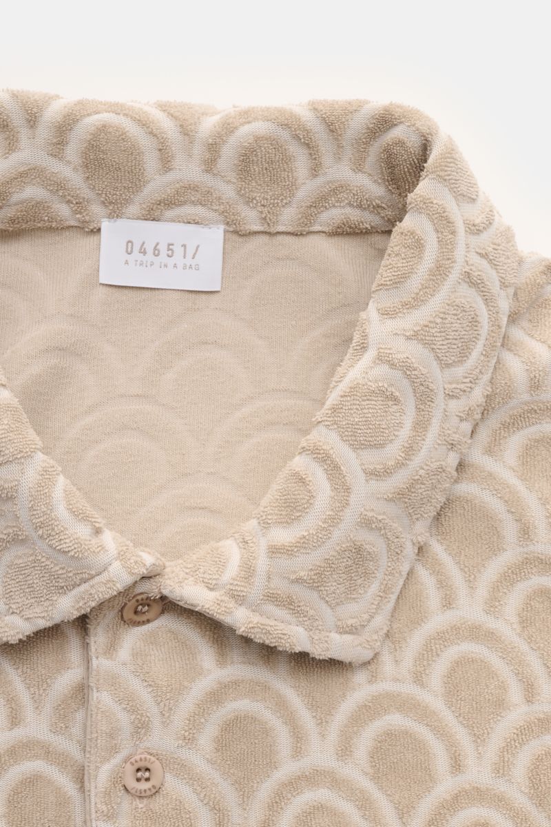 04651/ A trip in a bag Frottee-Poloshirt 'Terry Jaquard' beige gemustert