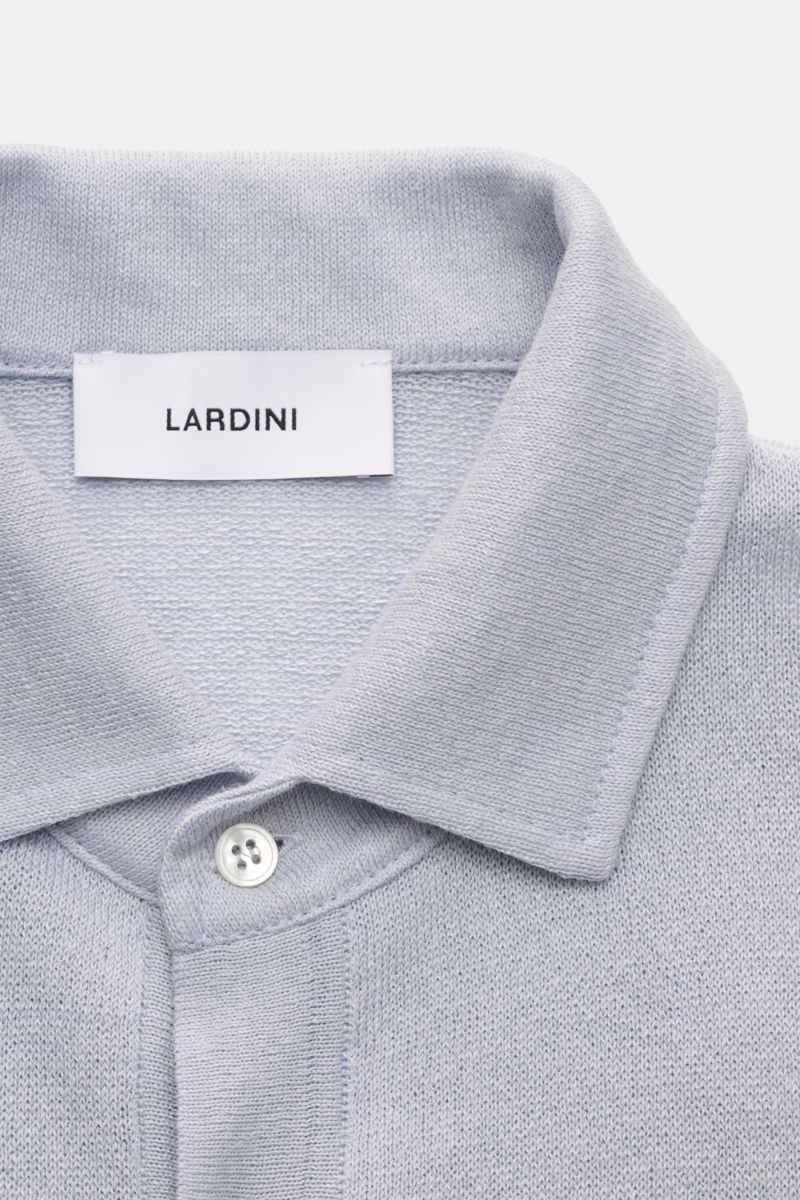 Lardini Short sleeve knit polo smoky blue shown from a close-up top front perspective, featuring a linen and cotton blend, slightly robust, fine airy knit, slim fit, signature polo collar, three-button placket, and flexible ribbed bands. Elegance for warm