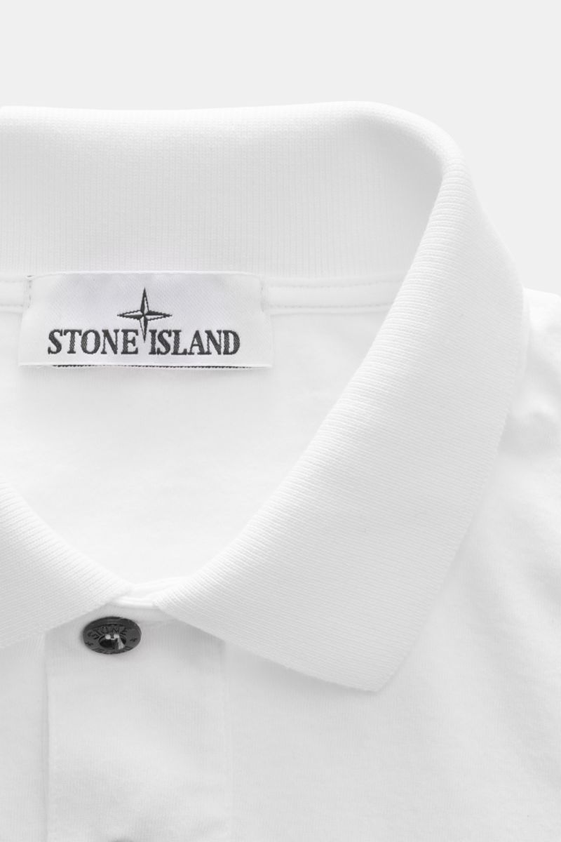 Close-up front view of Stone Island Jersey-polo shirt white showing collar, two-button placket, and fabric label.

Description: This lightweight polo shirt is a must-have for sporty men’s wardrobes: Made of cotton jersey, this timeless model by STONE ISLA
