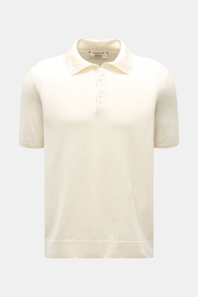 Front view of Fioroni Short sleeve knit polo cream in a lightweight linen and cotton blend, featuring a dress-shirt collar and three-button placket.  

Description: Summery luxury: This short-sleeved knit polo by FIORONI embodies the finest Italian kni