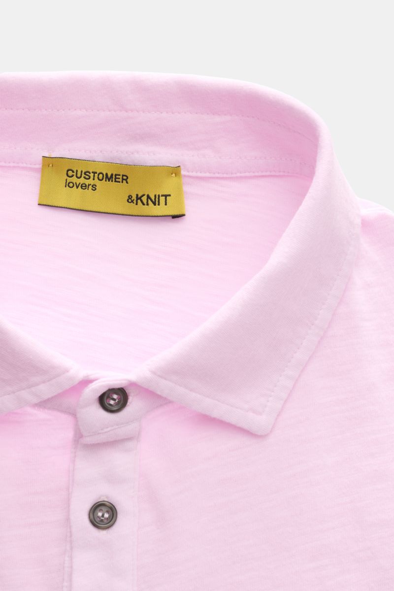 Close-up front view of the B.F. Knitwear Jersey polo shirt rose mottled showing its classic polo shirt collar, two buttons, and soft pure cotton fabric. Uncomplicated classic: This jersey polo shirt by B.F. KNITWEAR is a versatile basic for the warmer mon