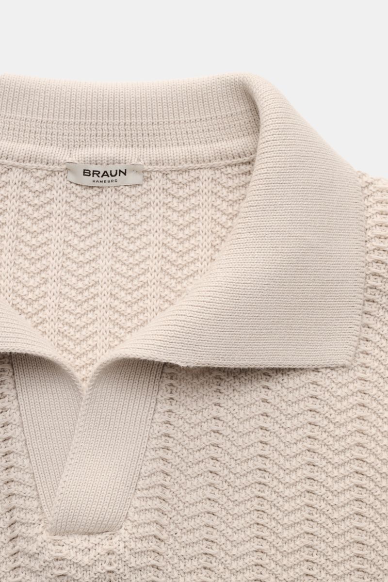 Gran Sasso Short sleeve knit polo beige shown from a top-front close-up, featuring a classic polo collar, open collar placket, wide ribbed bands, and a textured, robust pure cotton knit fabric with a slim fit. Classic polo silhouette meets a distinctive f