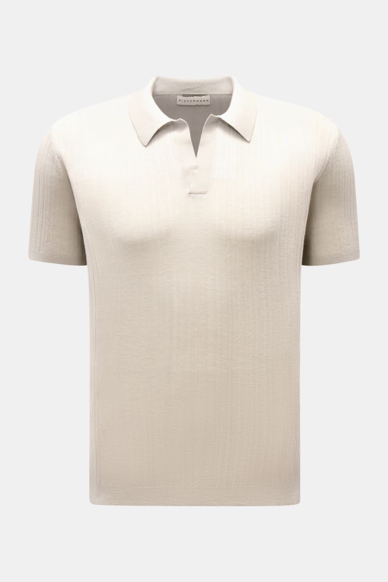 Front view of Kiefermann Merino short sleeve knit polo 'Bortiso' sand in fine textured, soft merino wool with slim fit and knit collar.

An elegant styling piece: For a holiday dinner or a walk on the promenade, this knit polo by KIEFERMANN offers exce