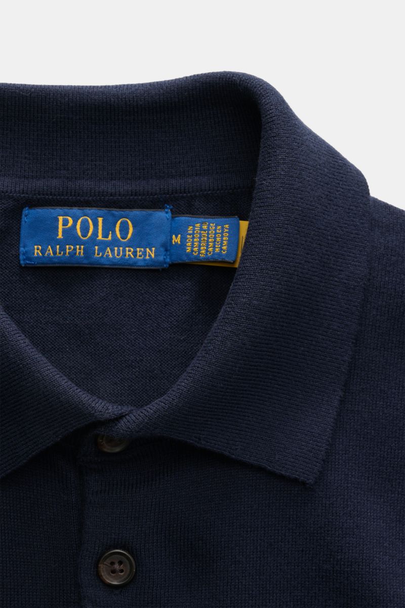 Close-up front view of Polo Ralph Lauren Short sleeve knit polo shirt navy showing collar, button placket, and label.

A summery classic: This short-sleeved knit polo by POLO RALPH LAUREN combines a timeless design with maximum comfort.

Fi