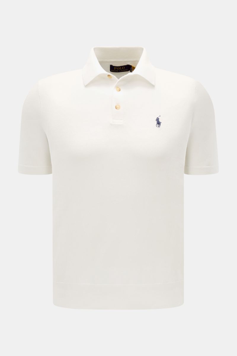 Polo Ralph Lauren Kurzarm-Strickpolo offwhite shown from front, featuring cotton knit, slim fit, polo collar, 3 buttons, logo stitching, elastic cuffs and hem. Sommerlicher Klassiker: Das Kurzarm-Strickpolo von POLO RALPH LAUREN verbindet zeitloses Des