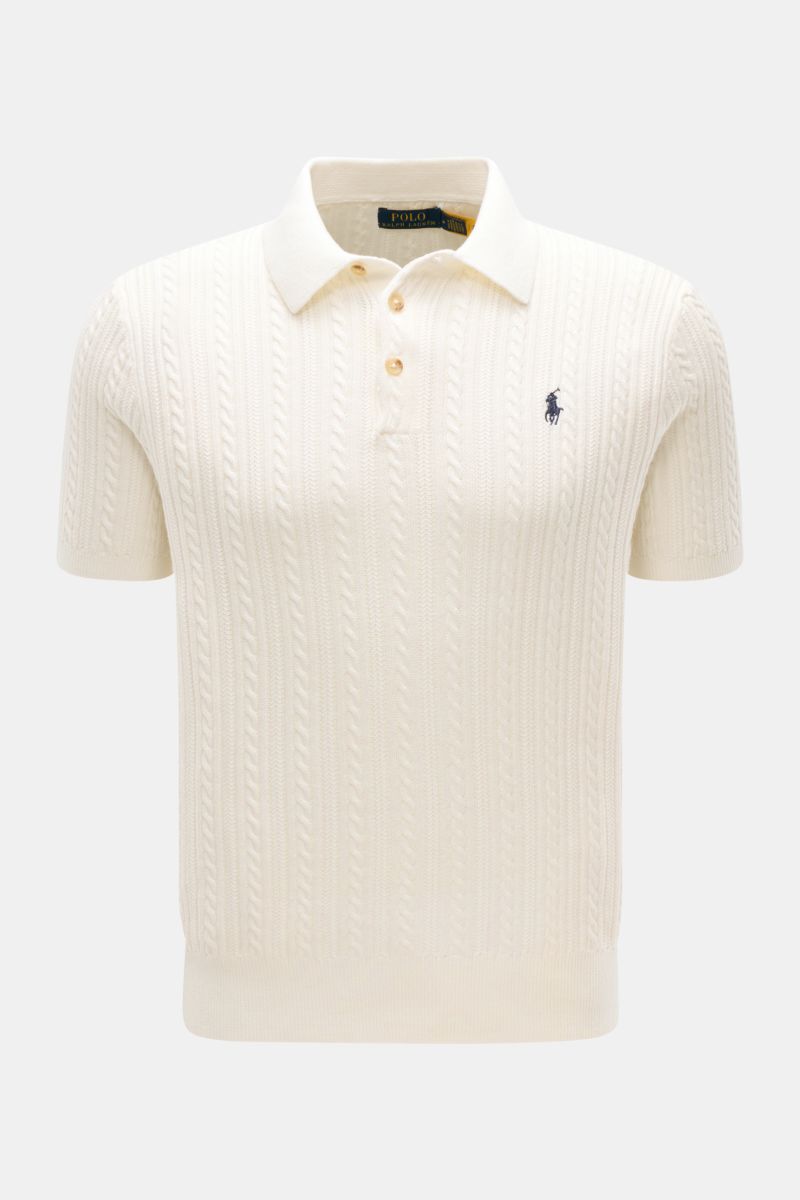 Front view of Polo Ralph Lauren Short sleeve knit polo shirt off-white with cable knit pattern, three-button placket, and logo stitching.

Versatile classic: This short-sleeved knit polo by POLO RALPH LAUREN delivers maximum comfort and catches the eye